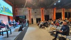 Iv�n Puentes, a la derecha, asiste a una e las charlas del Greening Cities en Tur�in