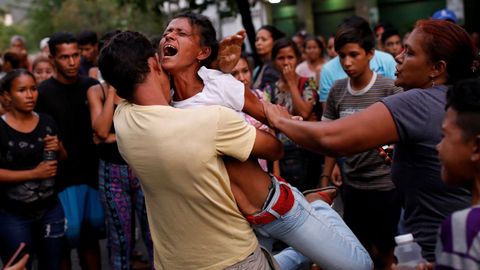 Al menos 68 muertos en un mot�n en unos calabozos de la polic�a en Venezuela
