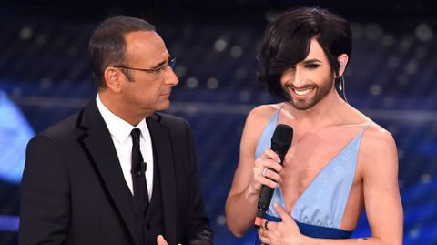 Conchita Wurst sorprendi� con su nuevo look en el tradicional festival de la canci�n de San Remo e hizo aumentar considerablemente la audiencia en televisi�n.
