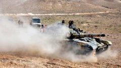 Un tanque del ej�rcito sirio avanza hacia Palmira