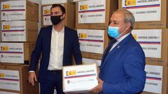 Riveira y Tom�, de izquierda a derecha, con las mascarillas