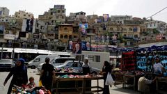 Los carteles de los candidatos a las legislativas cuelgan de las fachadas de un barrio de Tr�poli