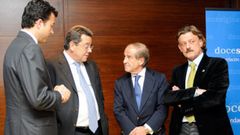 Miguel Cano, segundo por la izquierda, en un acto 