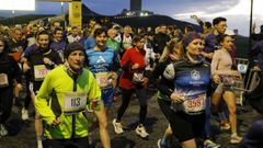 Participantes de la primera prueba del Coru�a 10, durante la carrera.