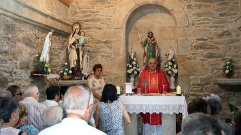 Misa de San Cristobal en la capilla de San Bartolom de Rianxo   bendicion de vehiculos y  procesin