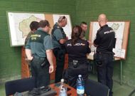 Una de las reuniones de coordinaci�n entre personal de la Brilat y agentes policiales. 