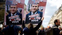 Manifestantes con carteles contra Macron, en una protesta en Par�s el pasado jueves