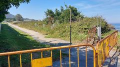 El Concello tuvo que colocar de nuevo se�alizaci�n provisional que impide el acceso al paseo despu�s de que desconocidos arrancaran el cierre