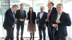 Los conselleiros de Sanidade y Educaci�n con los rectores de las universidades, ayer en Santiago. 