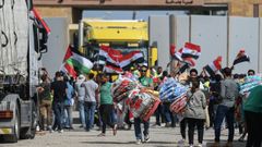 Los camiones regresan al lado egipcio tras entregar ayuda a Gaza a trav�s del paso de Rafah.