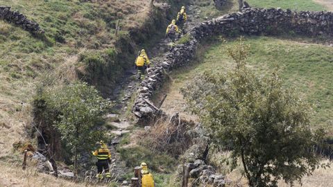 Trabajadores de extinción en el Macizo Central en el mes de agosto