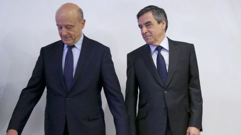 Jupp�, a la izqquierda, con Fillon, tras el resultado