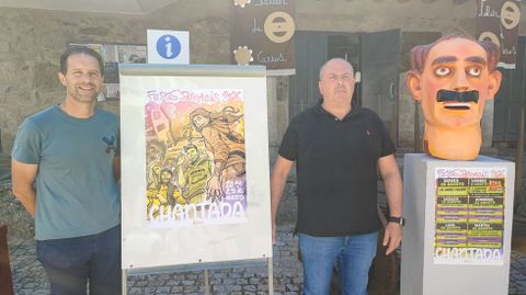 Manuel Di�guez, a la derecha, con el autor del cartel en la presentaci�n