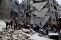 B�squeda de supervivientes en Alepo tras un ataque a�reo con bombas de barril. 