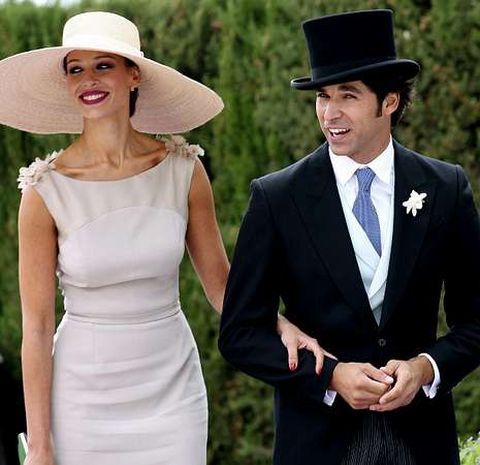 La pareja, en una boda. 