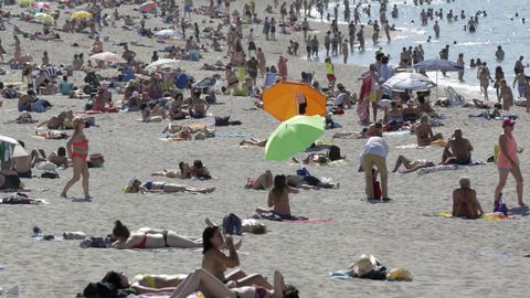 D�A DE CALOR EN LA PLAYA DE RIAZOR