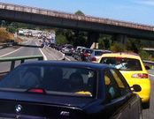Coches saliendo de la AP-9 hacia Mi�o. 