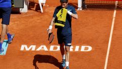 El tenista espaol Pablo Carreo ante el estadounidense Reilly Opelka durante su partido de ronda clasificatoria del Mutua Madrid Open de tenis que se disputa en la Caja Mgica, en Madrid