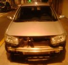 Estado en el que qued� el turismo en el que iban los detenidos. 