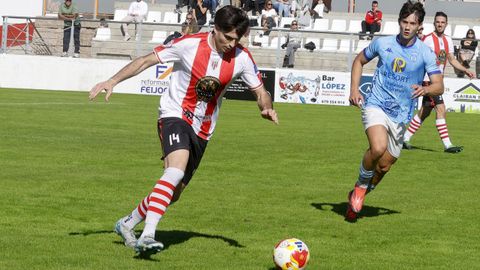 Arnosi se dispone a golpear la pelota ante la presin del viveirista Tonini.