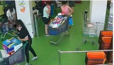 Imagen de las tres mujeres que hurtaban productos en supermercados ourensanos y salan sin pagar con los carros llenos.