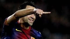Xavi celebra un gol del Bar�a