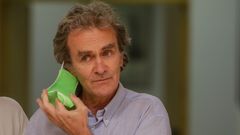 Fernando Sim�n se quita su mascarilla para iniciar su intervenci�n