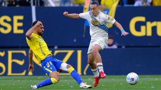 Luismi Cruz, con Climent durante una jugada del C�diz-D�por