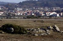 El juzgado dice que el istmo de A Lanzada pertenece a la comunidad de San Marti�o.