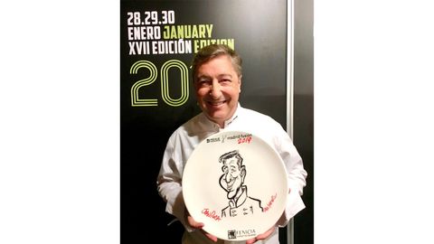 Joan Roca, con su caricatura.