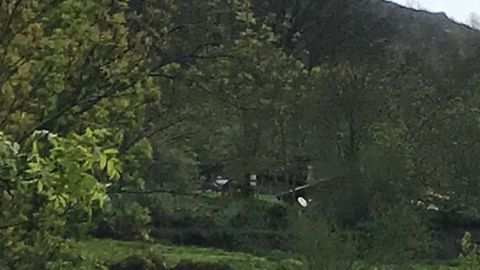 Zona de Eros, con el equipo forense y judicial al fondo