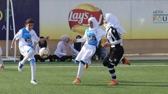 Las jugadoras del Deportivo, durante un partido en el campo de refugiados