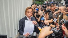 El abogado Lawrence Lau, uno de los dos imputados declarados inocentes, el jueves durante un descanso del tribunal.
