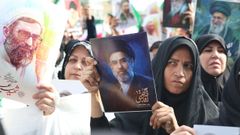 Ciudadanos iran�es se manifiestan en la plaza de Teher�n en apoyo a su Gobierno.