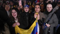 Ciudadanos venezolanos en la concentraci�n celebrada en Madrid tras la operaci�n de Estados Unidos en Venezuela