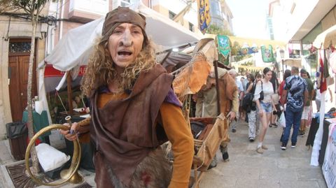 <span lang= gl >O gran mercado est� animado por singulares personaxes</span>