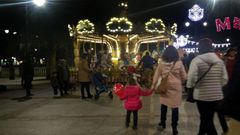 Carrusel en la plaza de Bego�a