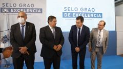 Los rectores de las universidades de Vigo, A Coru�a y Santiago, con el conselleiro Rom�n Rodr�guez