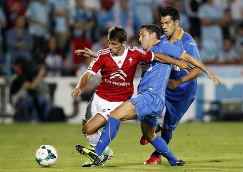 Jonny y el exc�ltico Roberto Lago, ayer en Getafe.