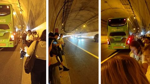 Instant�neas tomadas por usuarios del bus con los viajeros apeados en pleno t�nel de la autopista