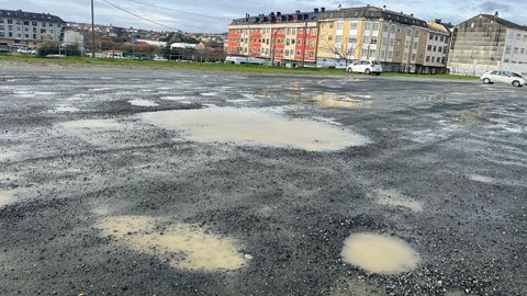 Baches en un aparcamiento en A Solaina. 