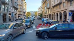 La calle Sebastin Martnez Risco, llena de coches poco antes de las 9.30 horas del martes