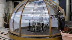 Algunos restaurantes de Londres han instalado igl�s para poder consumir en tiempos de covid.