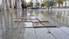 Baldosas levantadas en San Marcos