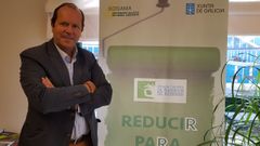 El presidente de Sogama, junto al cartel del programa �Reducir para sumar� 