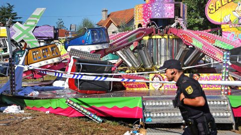 Imagen de archivo de agentes de la polic�a con la atracci�n acidentada en Matam�