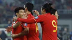 Los jugadores de la selecci�n china celebran un gol en el partido celebrado esta ma�ana