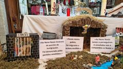 Carteles explican la situaci�n del bel�n de Camb�s.