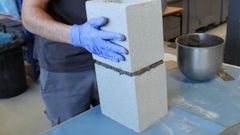 Material de los residuos de la fabricaci�n de asfalto reutilizado en la construcci�n