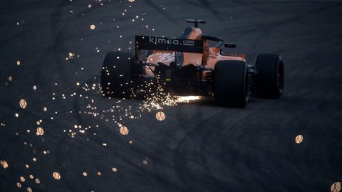 McLaren's Spanish driver Fernando Alonso steers his car during the qualifying session for the Formula One Chinese Grand Prix in Shanghai 